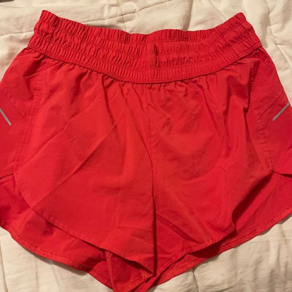 Pink running shorts